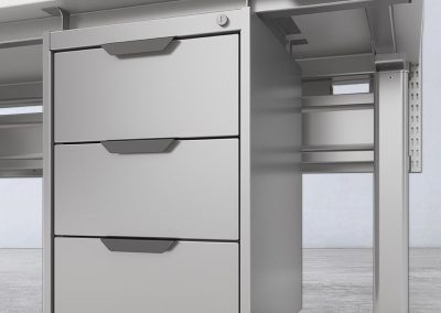 Stacked steel drawers on ergonomic workstation